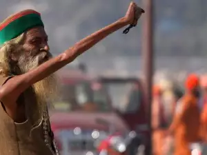 Indian Man has Been Living for 38 Years with Hand Raised to Shiva