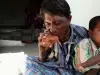 A Chinese Man Eats Nails, While an Indian Man Eats Bricks